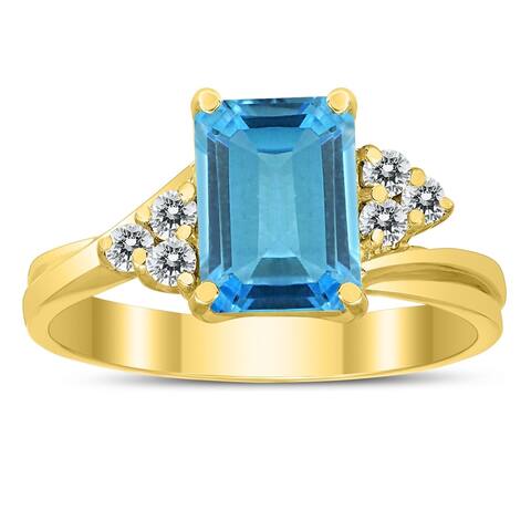 8X6MM Blue Topaz and Diamond Twist Ring in 10K Yellow Gold
