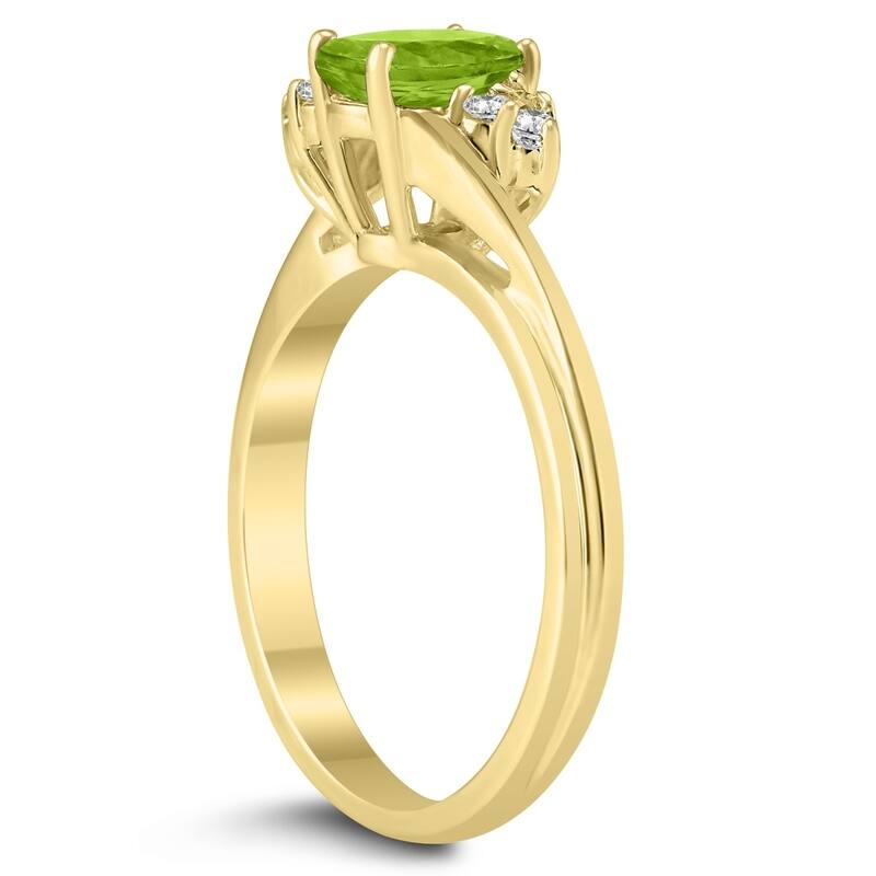 7X5MM Peridot and Diamond Twist Ring in 10K Yellow Gold