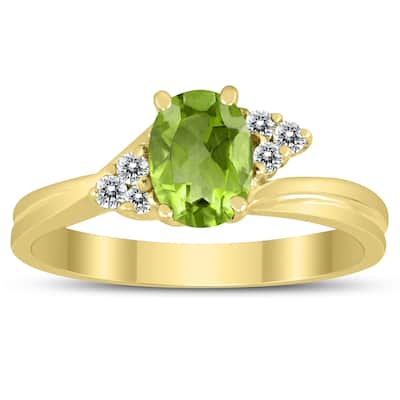 7X5MM Peridot and Diamond Twist Ring in 10K Yellow Gold