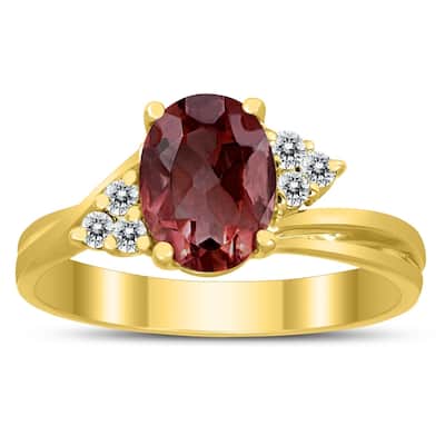 8X6MM Garnet and Diamond Twist Ring in 10K Yellow Gold