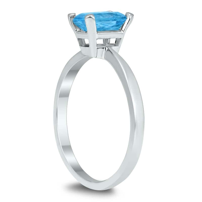 Emerald Shaped 7X5MM Blue Topaz Solitaire Ring in 10K White Gold