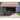 ALEKO Motorized 20'x10' Black Frame Retractable Home Patio Canopy Awning Multi Red
