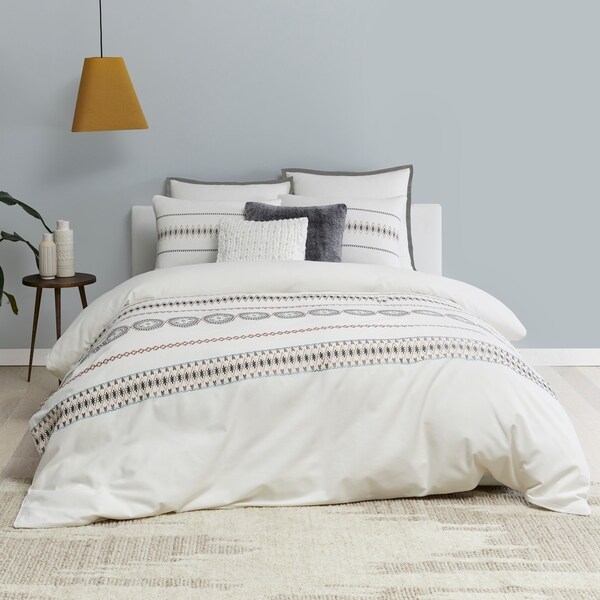 white embroidered bedding set