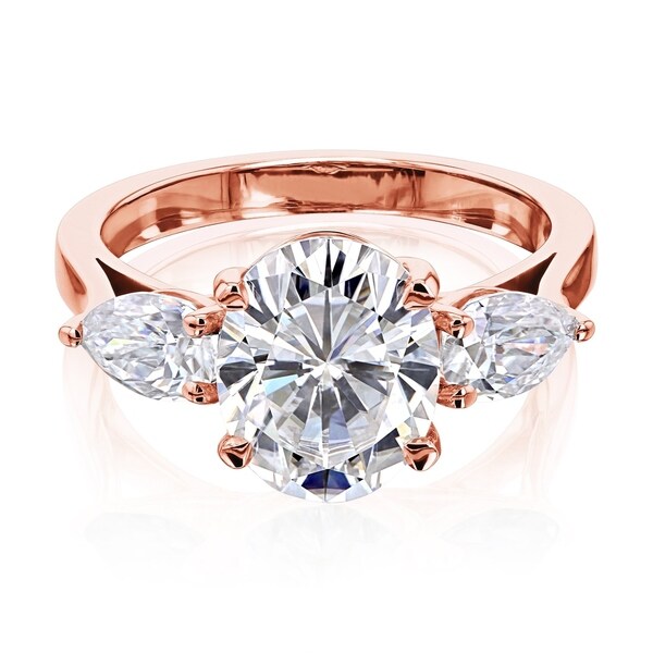 Annello by Kobelli 3.86ct TGW Three Stone Trellis X-Prong Oval and Pear Moissanite Engagement Ring in 14k Gold (GH/VS). Opens flyout.