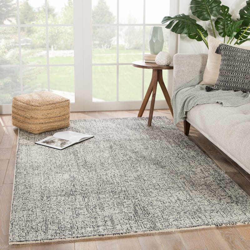 Carson Carrington Tannsele Handmade Solid Cream/ Black Area Rug