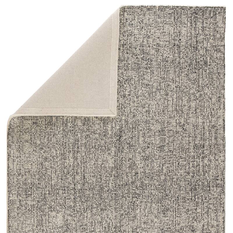 Carson Carrington Tannsele Handmade Solid Cream/ Black Area Rug