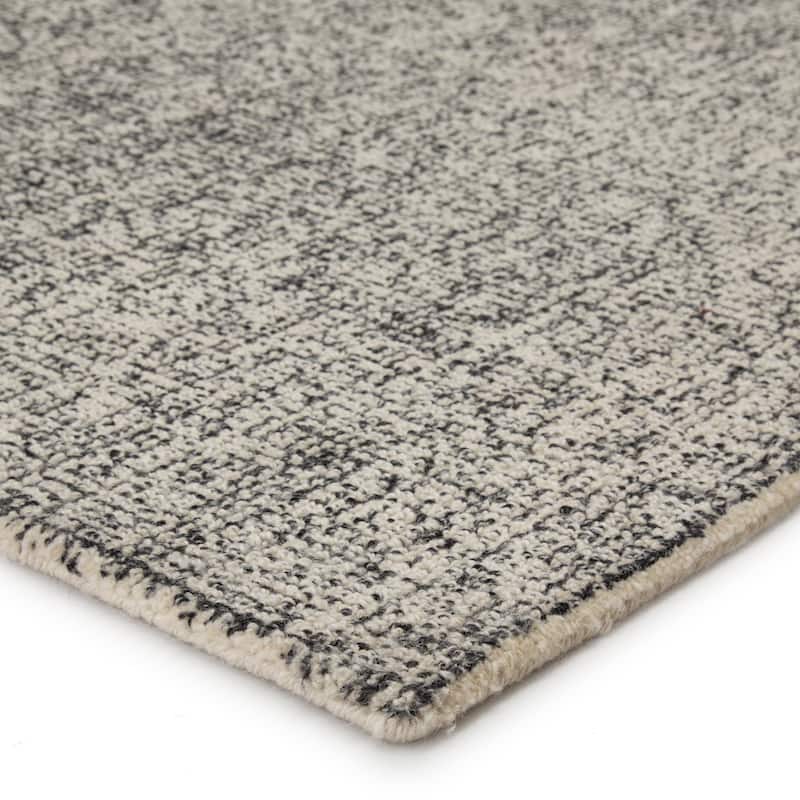 Carson Carrington Tannsele Handmade Solid Cream/ Black Area Rug