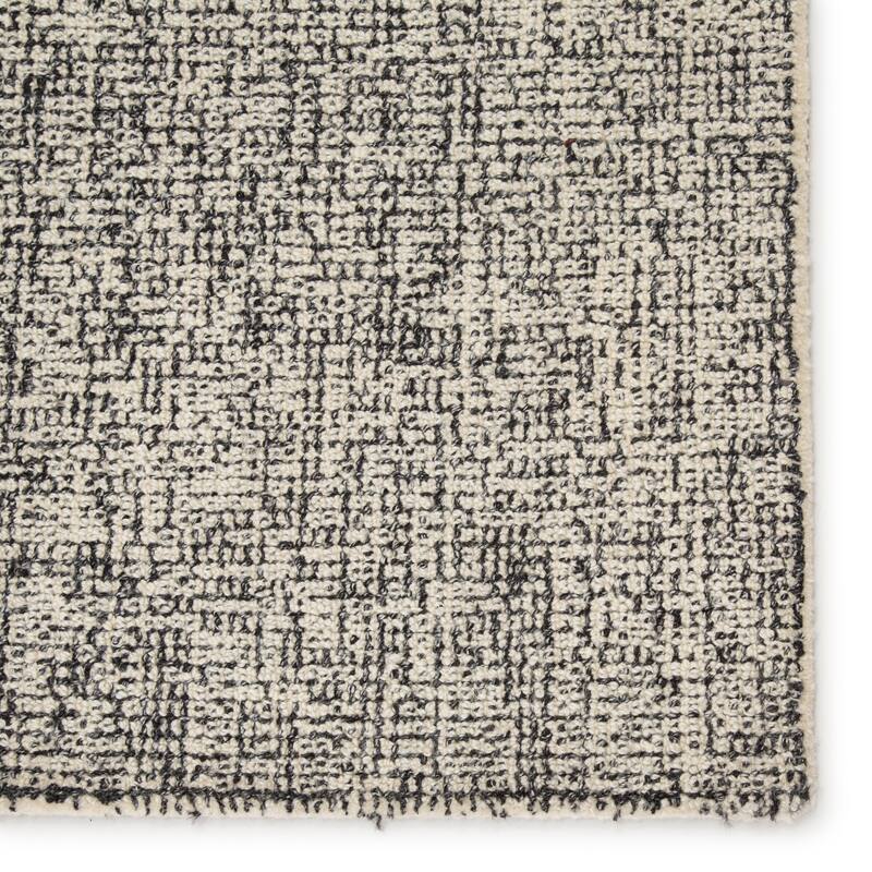 Carson Carrington Tannsele Handmade Solid Cream/ Black Area Rug
