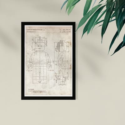 Wynwood Studio Framed Wall Art Prints 'Lego Toy Figure 1979 Parchment'
