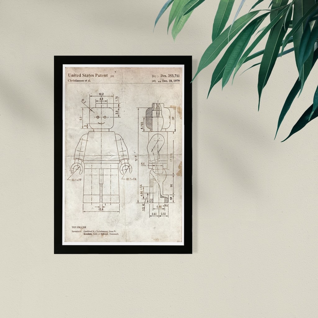 Wynwood Studio Framed Wall Art Prints 'Lego Toy Figure 1979 Parchment'