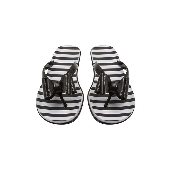 black jelly flip flops with bow