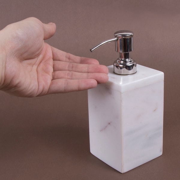 white liquid soap dispenser