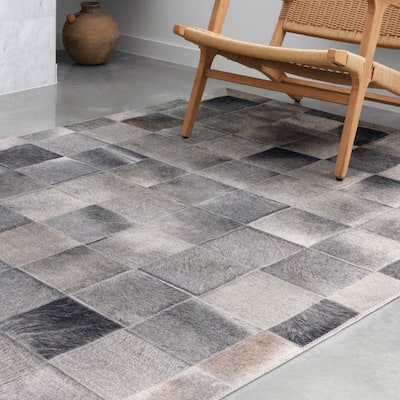 Alexander Home Davide Faux Cowhide Area Rug