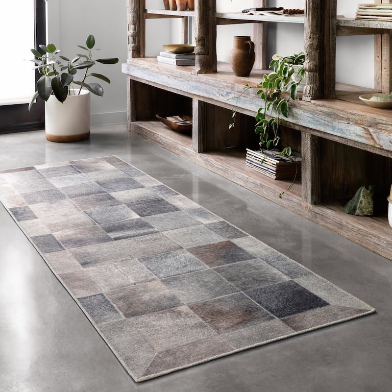 Alexander Home Davide Faux Cowhide Area Rug