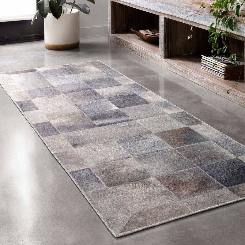 Alexander Home Davide Faux Cowhide Area Rug