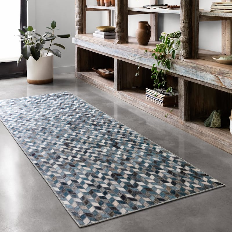 Alexander Home Davide Printed Geometric Faux Cowhide Area Rug