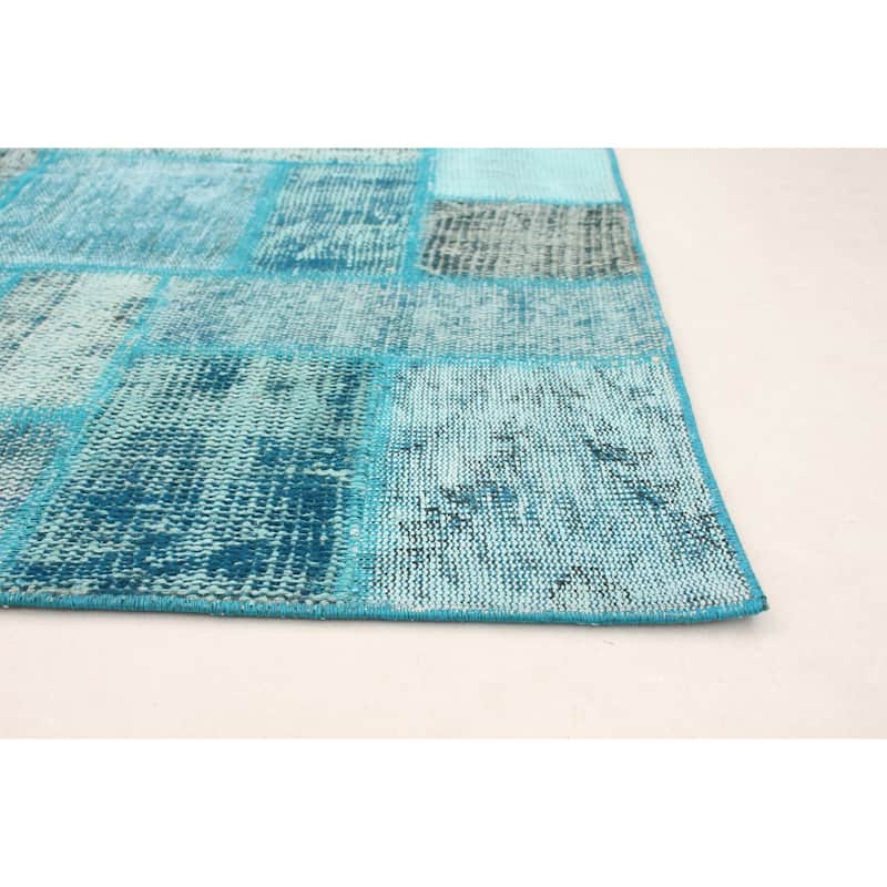 Hand-knotted Color Patchwork Turquoise Wool Rug - 6'11" x 9'9"