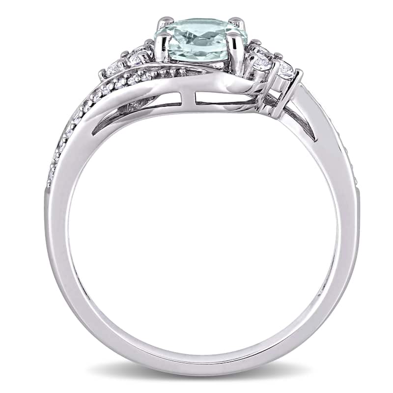 Miadora 10k White Gold Aquamarine, White Topaz and 1/10ct TDW Diamond Bypass Engagement Ring