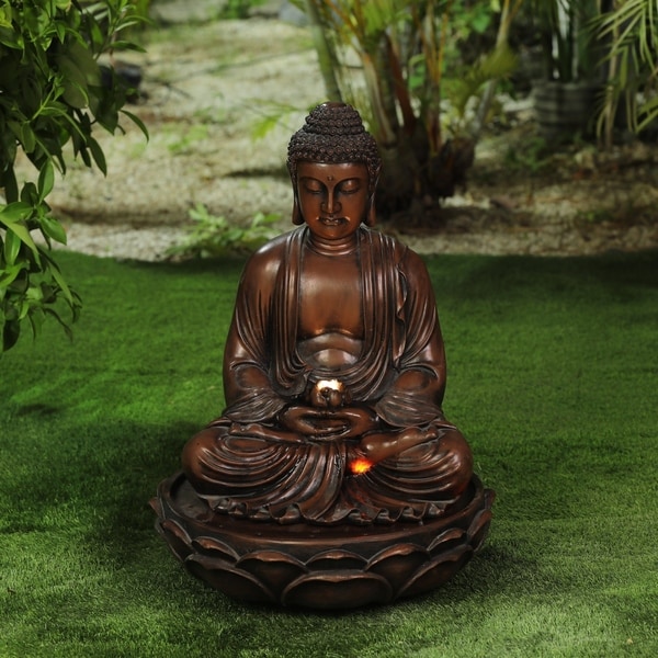 resin meditating buddha on column patio fountain with led light