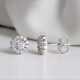 preview thumbnail 1 of 10, 1/5ct TDW Diamond Halo Stud Earrings in Silver Rhodium by De Couer White