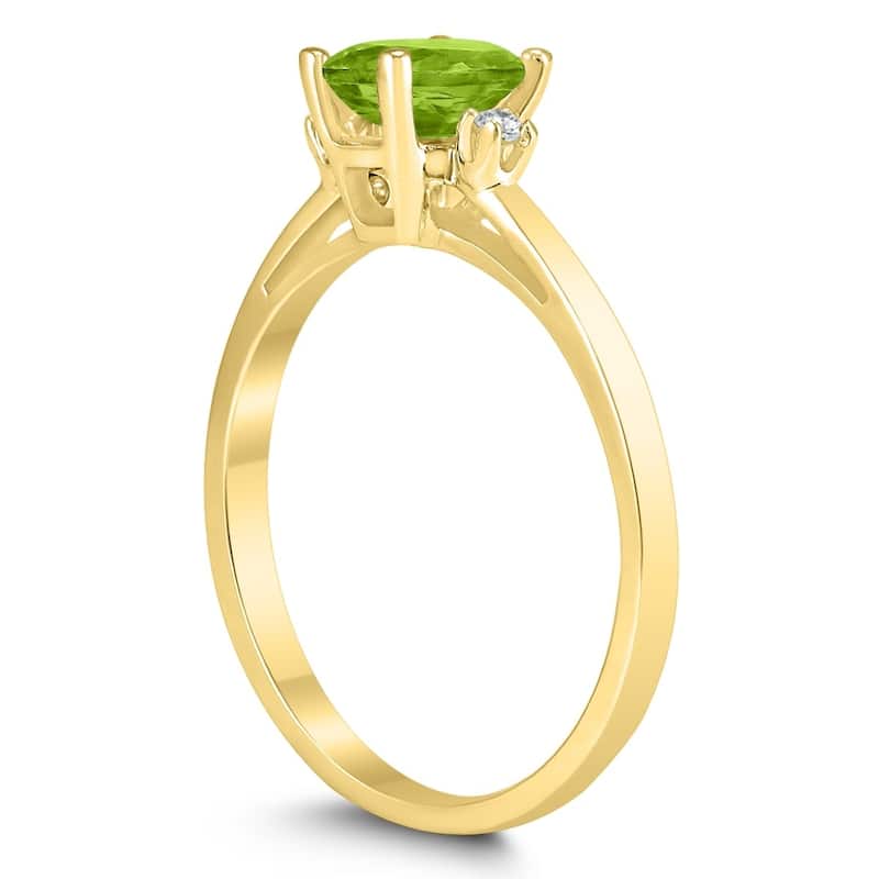 Emerald Cut 6X4MM Peridot and Diamond Three Stone Ring in 10K Yellow Gold