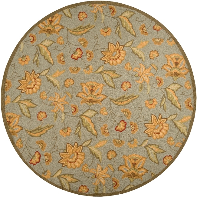 Hand hooked Tropic Collection Indoor/outdoor Floral Rug (8 Round) (BluePattern FloralMeasures 0.437 inch thickTip We recommend the use of a non skid pad to keep the rug in place on smooth surfaces.All rug sizes are approximate. Due to the difference of 