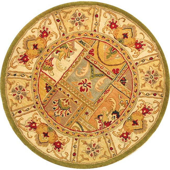 Handmade Classic Empire Wool Panel Rug (36 Round) (GreenPattern OrientalMeasures 0.625 inch thickTip We recommend the use of a non skid pad to keep the rug in place on smooth surfaces.All rug sizes are approximate. Due to the difference of monitor color