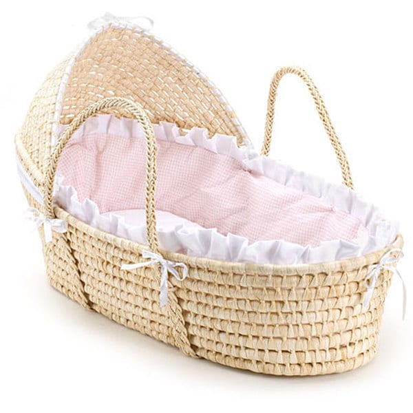 pink moses basket with drapes