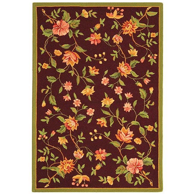 Hand hooked Garden Burgundy Wool Rug (39 X 59) (RedPattern FloralMeasures 0.375 inch thickTip We recommend the use of a non skid pad to keep the rug in place on smooth surfaces.All rug sizes are approximate. Due to the difference of monitor colors, some