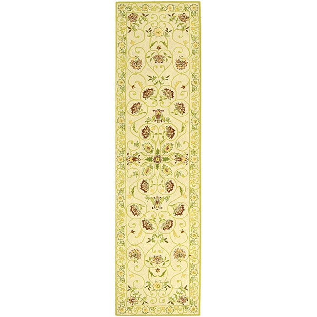 Hand hooked Bedford Ivory/ Green Wool Runner (26 X 10) (IvoryPattern FloralMeasures 0.375 inch thickTip We recommend the use of a non skid pad to keep the rug in place on smooth surfaces.All rug sizes are approximate. Due to the difference of monitor co