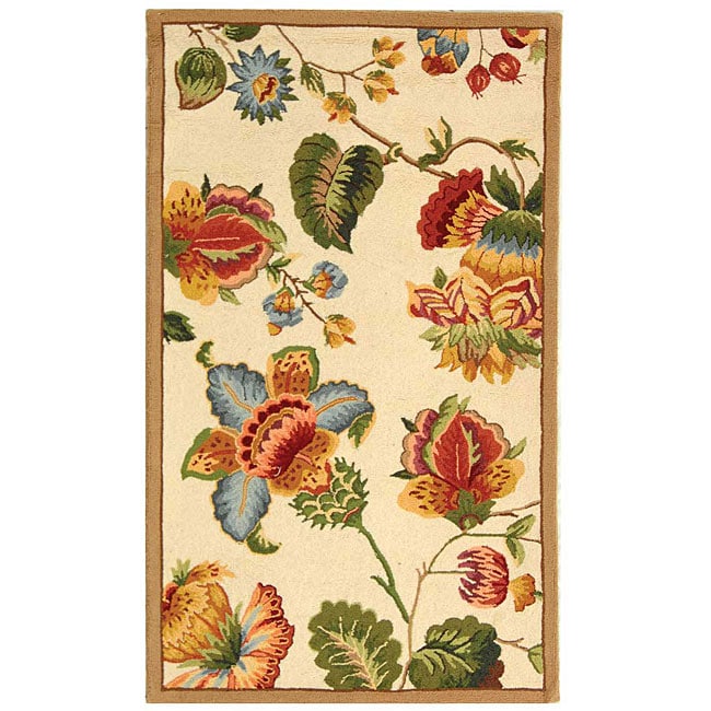 Hand hooked Transitional Ivory Wool Rug (29 X 49) (IvoryPattern FloralMeasures 0.375 inch thickTip We recommend the use of a non skid pad to keep the rug in place on smooth surfaces.All rug sizes are approximate. Due to the difference of monitor colors,