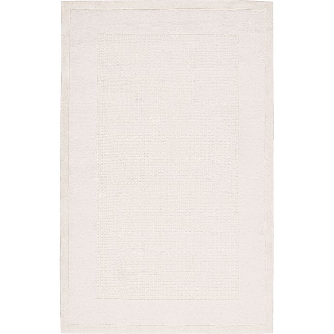 Nourison Hand tufted Westport Ivory Wool Rug (5 X 8) (ivoryPattern SolidMeasures 3/4 inch thickTip We recommend the use of a non skid pad to keep the rug in place on smooth surfaces.All rug sizes are approximate. Due to the difference of monitor colors,