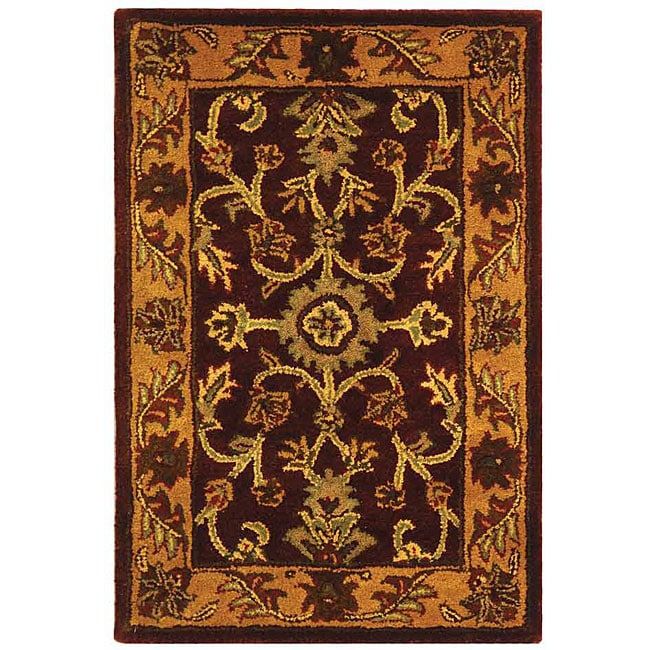 Safavieh Handmade Golden Jaipur Burgundy/ Gold Wool Rug (2 X 3) (RedPattern OrientalMeasures 0.625 inch thickTip We recommend the use of a non skid pad to keep the rug in place on smooth surfaces.All rug sizes are approximate. Due to the difference of m
