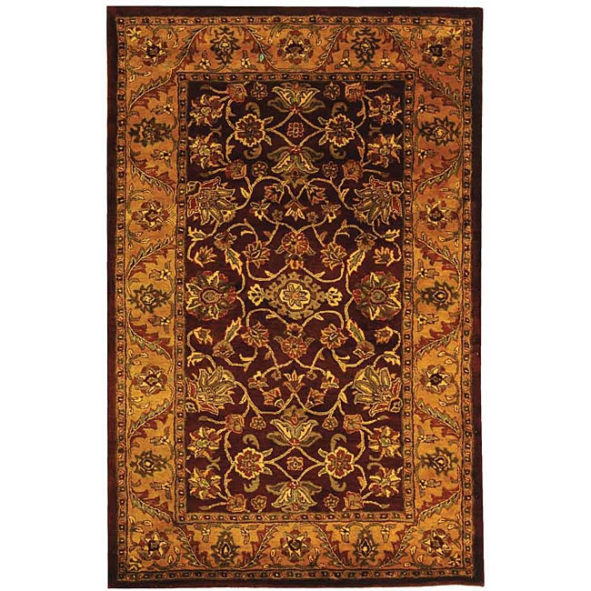 Safavieh Handmade Golden Jaipur Burgundy/ Gold Wool Rug (4 X 6) (RedPattern OrientalMeasures 0.625 inch thickTip We recommend the use of a non skid pad to keep the rug in place on smooth surfaces.All rug sizes are approximate. Due to the difference of m