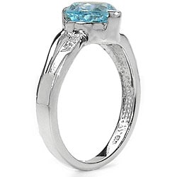 925 sterling silver blue topaz ring with two diamonds