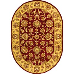 Safavieh Handmade Heritage Traditional Kerman Red/ Gold Wool Rug - 4'6" x 6'6" oval