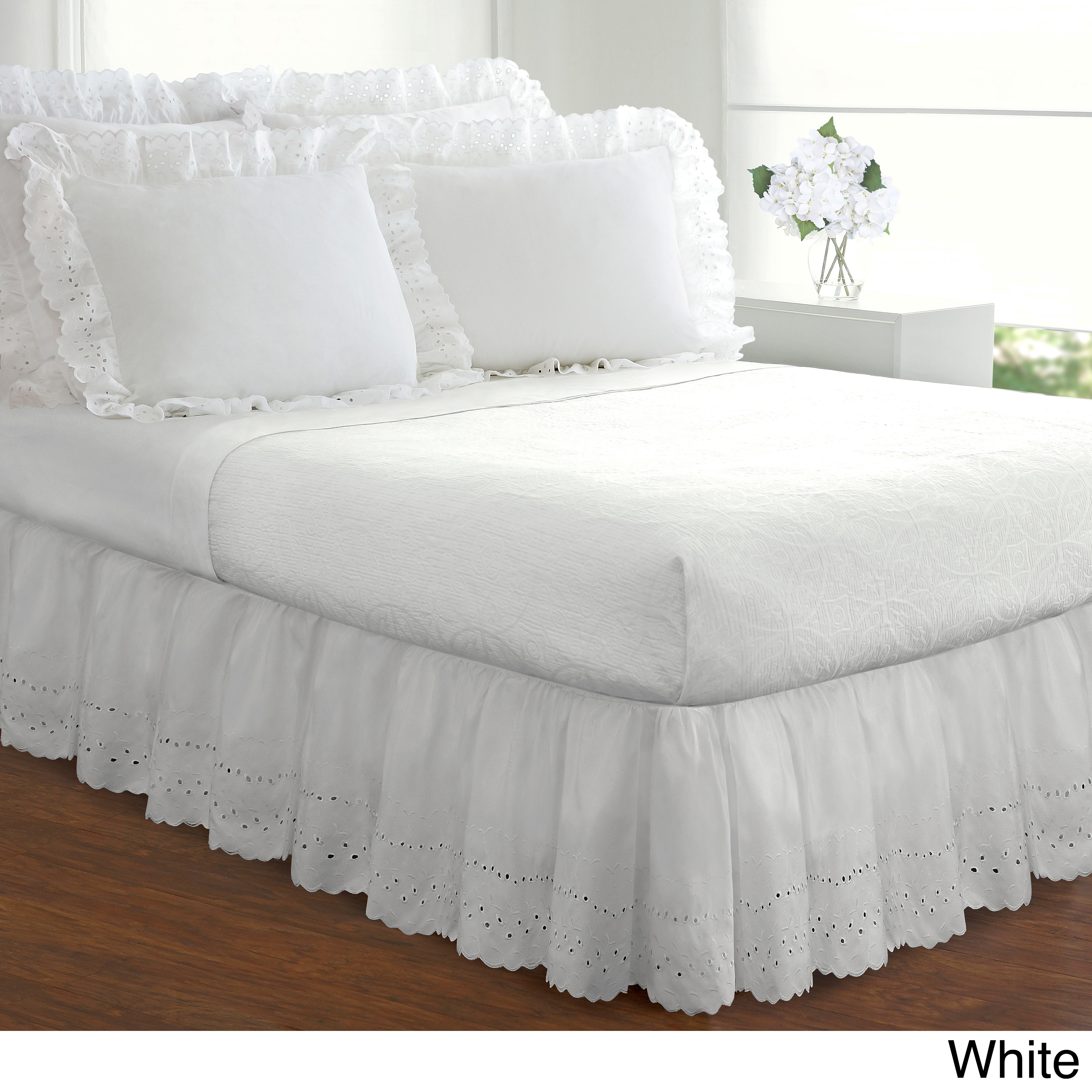 white ruffled bedspreads