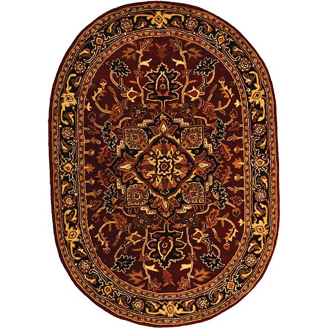 Handmade Classic Heriz Red/ Navy Wool Rug (46 X 66) (RedPattern OrientalMeasures 0.625 inch thickTip We recommend the use of a non skid pad to keep the rug in place on smooth surfaces.All rug sizes are approximate. Due to the difference of monitor color
