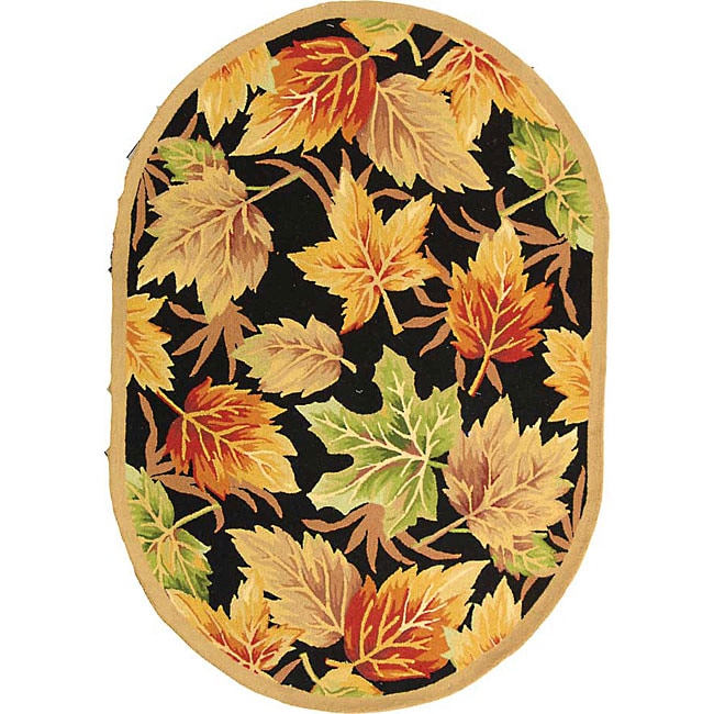 Hand hooked Foliage Black Wool Rug (76 X 96 Oval) (BlackPattern FloralMeasures 0.375 inch thickTip We recommend the use of a non skid pad to keep the rug in place on smooth surfaces.All rug sizes are approximate. Due to the difference of monitor colors,