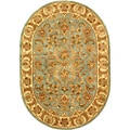 Safavieh Handmade Heritage Timeless Traditional Blue/ Beige Wool Rug (7'6 x 9'6 Oval)