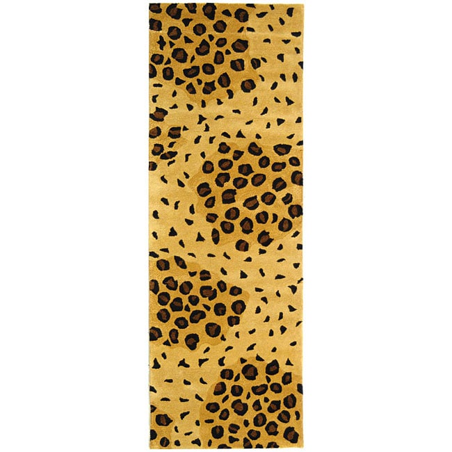 Handmade Leopard print Gold/ Black N. Z. Wool Runner (26 X 10) (GoldPattern AnimalMeasures 0.625 inch thickTip We recommend the use of a non skid pad to keep the rug in place on smooth surfaces.All rug sizes are approximate. Due to the difference of mon