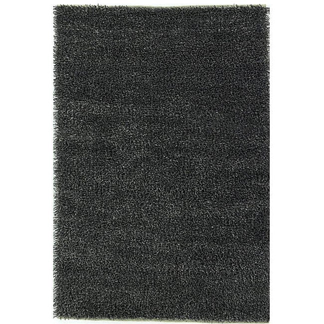 Hand woven Black/ White Polyester Rug (6 X 9) (blackPattern solidMeasures 1.6 inches thickTip We recommend the use of a non skid pad to keep the rug in place on smooth surfaces.All rug sizes are approximate. Due to the difference of monitor colors, some