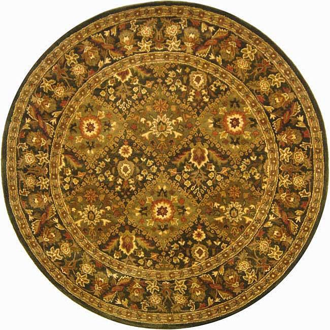 Handmade Tabriz Olive Wool Rug (4 X 6) (GreenPattern OrientalMeasures 0.625 inch thickTip We recommend the use of a non skid pad to keep the rug in place on smooth surfaces.All rug sizes are approximate. Due to the difference of monitor colors, some rug