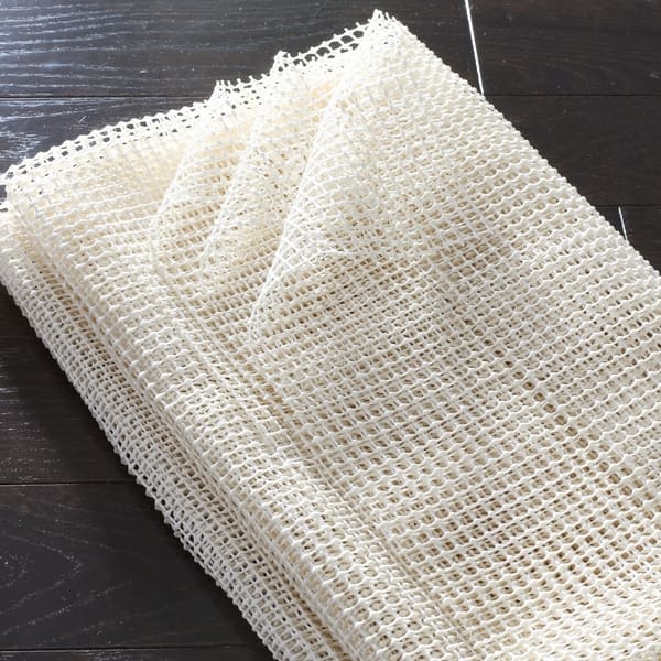 https://ak1.ostkcdn.com/images/products/3962804/Safavieh-Ultra-Non-slip-Rug-Pad-Off-White-fb3547c2-c076-4f26-87bb-88ed7dbc9431_600.jpg?impolicy=medium