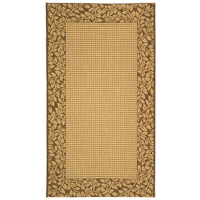 Indoor/ Outdoor Natural/ Brown Rug (710 X 11) (IvoryPattern BorderMeasures 0.25 inch thickTip We recommend the use of a non skid pad to keep the rug in place on smooth surfaces.All rug sizes are approximate. Due to the difference of monitor colors, some