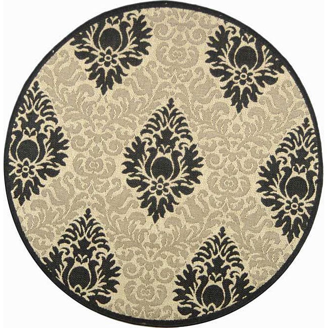 Indoor/ Outdoor St. Barts Sand/ Black Rug (67 Round) (BeigePattern FloralMeasures 0.25 inch thickTip We recommend the use of a non skid pad to keep the rug in place on smooth surfaces.All rug sizes are approximate. Due to the difference of monitor color
