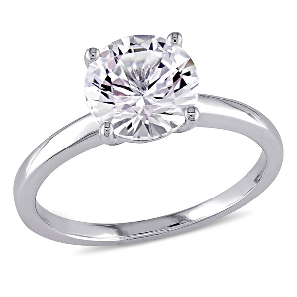 white sapphire solitaire ring