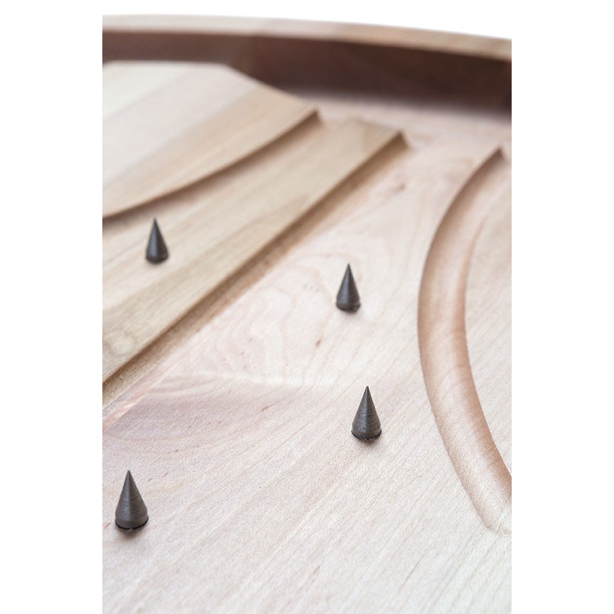 wooden carving board with spikes