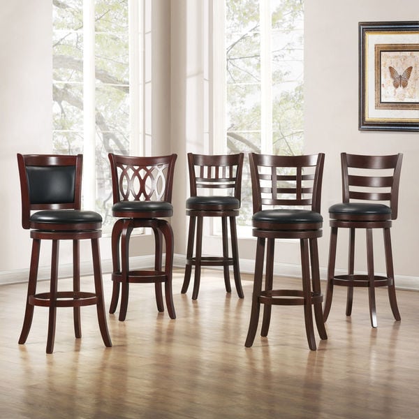 dark farmhouse table with white chairs