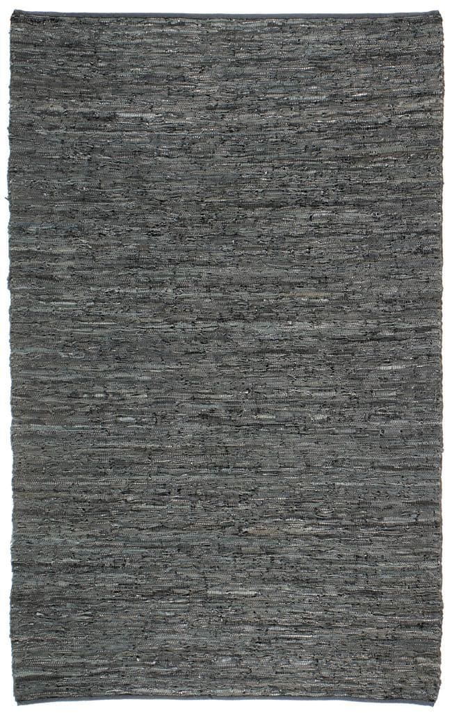 Hand woven Black Leather Chindi Rug (25 X 42) (BlackPattern SolidMeasures 0.125 inch thickTip We recommend the use of a non skid pad to keep the rug in place on smooth surfaces.All rug sizes are approximate. Due to the difference of monitor colors, some